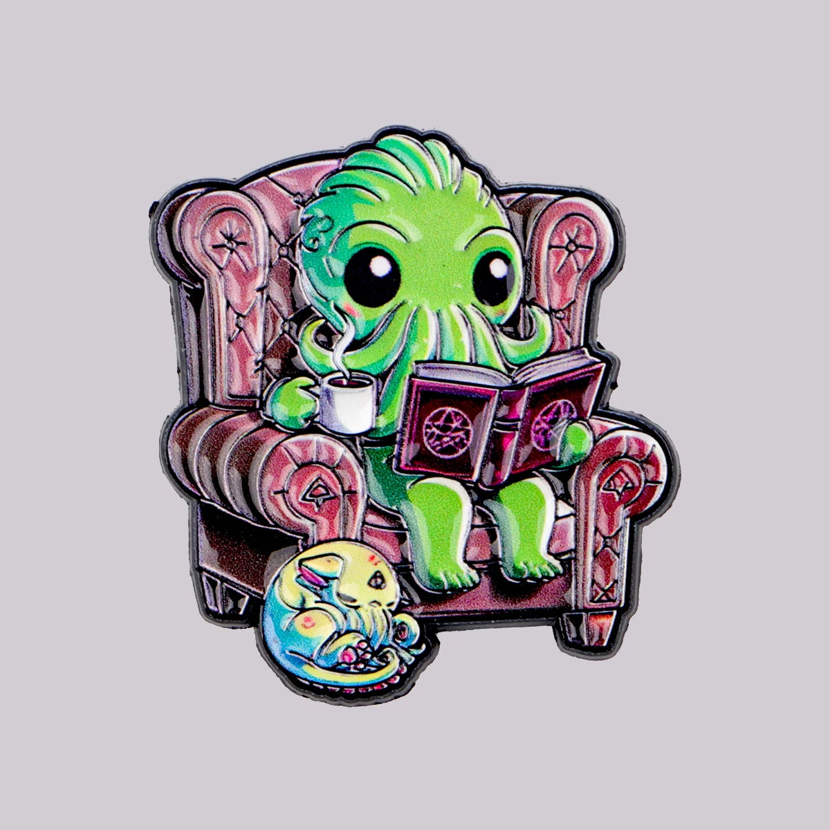 Colorful cthulhu character reading a book on a chair